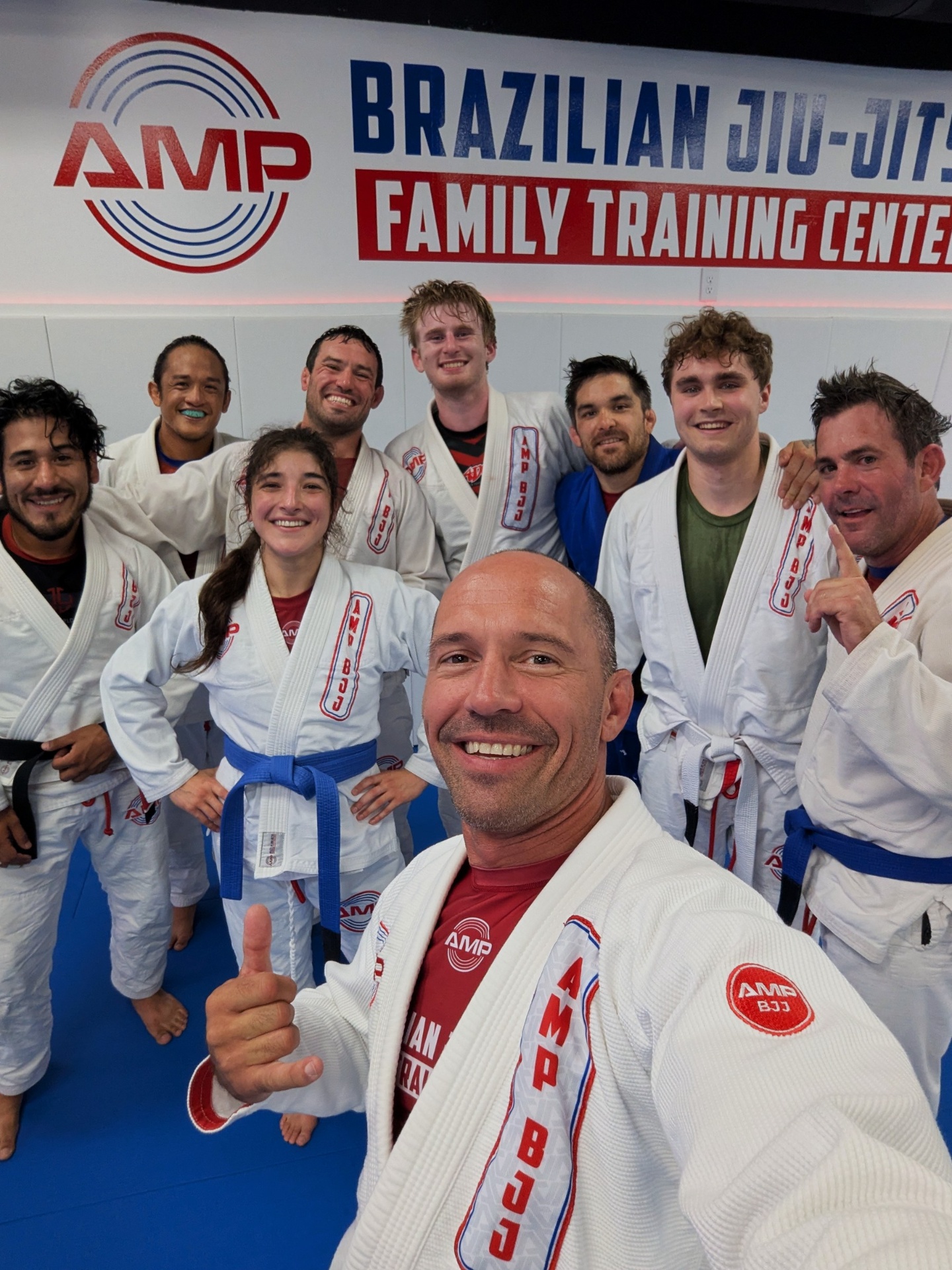AMP BJJ family group selfie after class