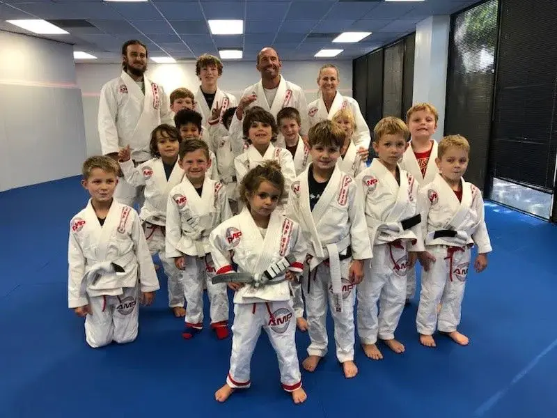 a group of students showing confidence through martial arts classes